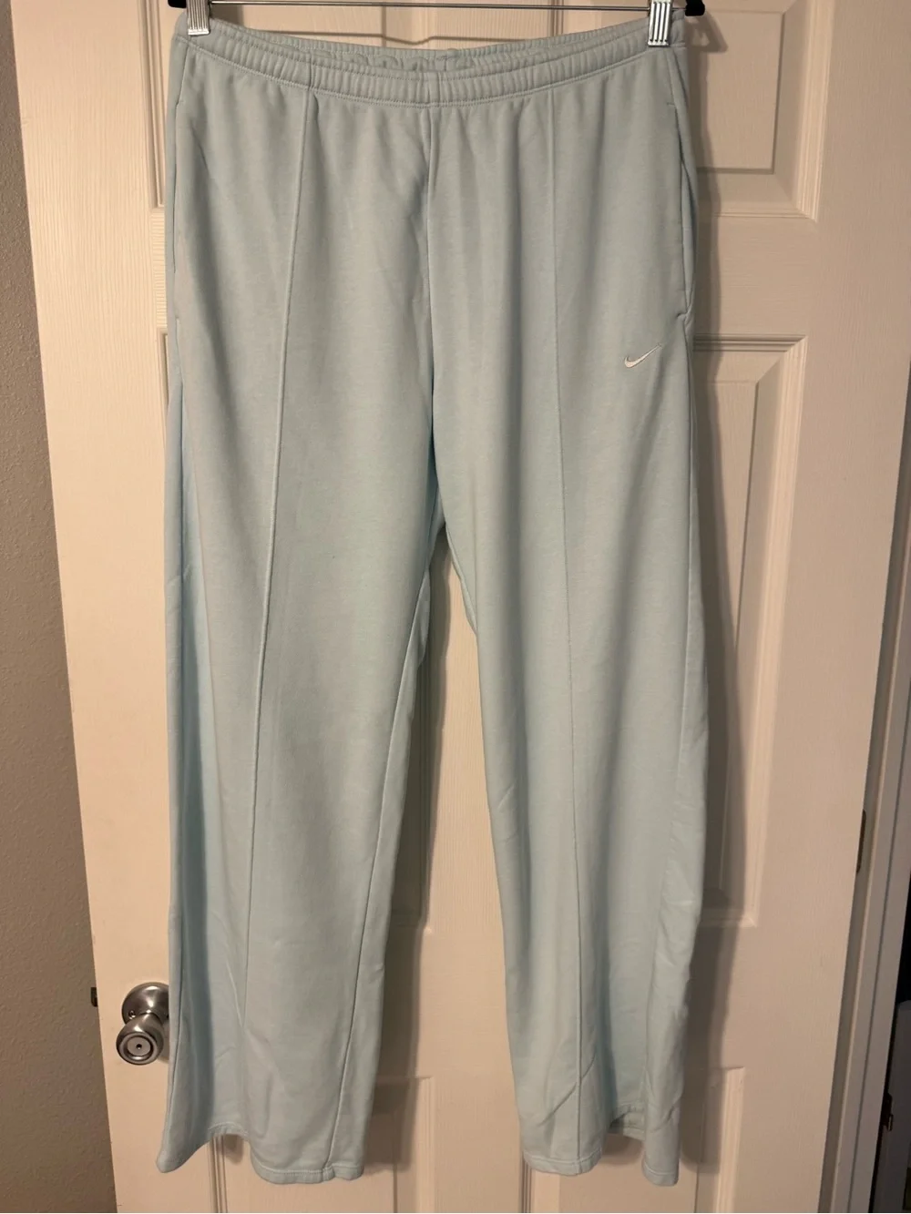 Nike Light Blue Women's Track Pants with White Swoosh